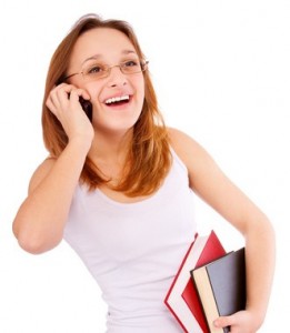 Girl-student stand with writing-books and mobile phone